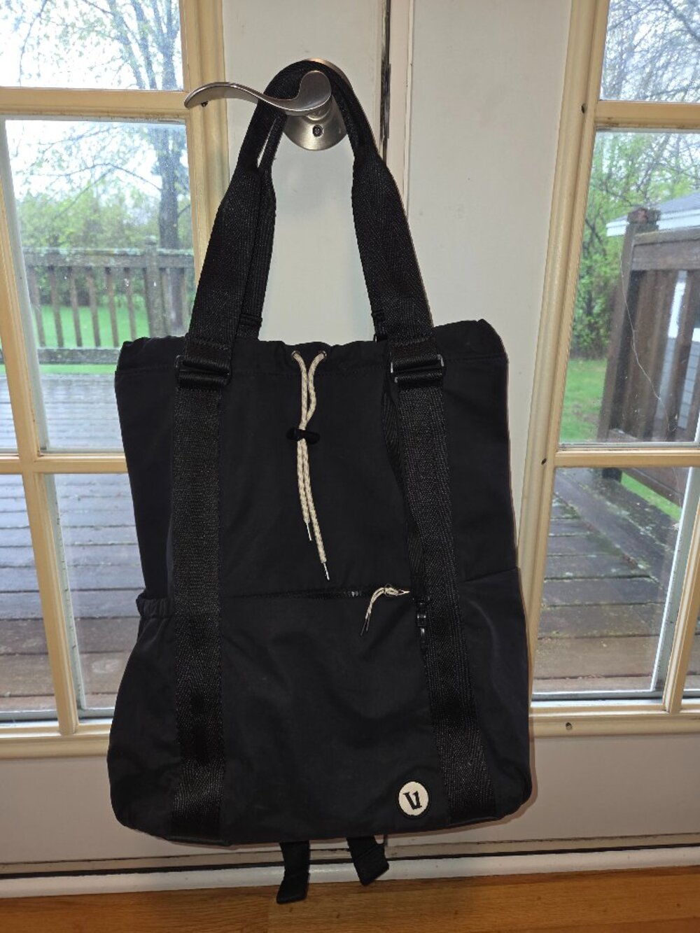 Vuori backpack - black, drawstring, camouflage liner